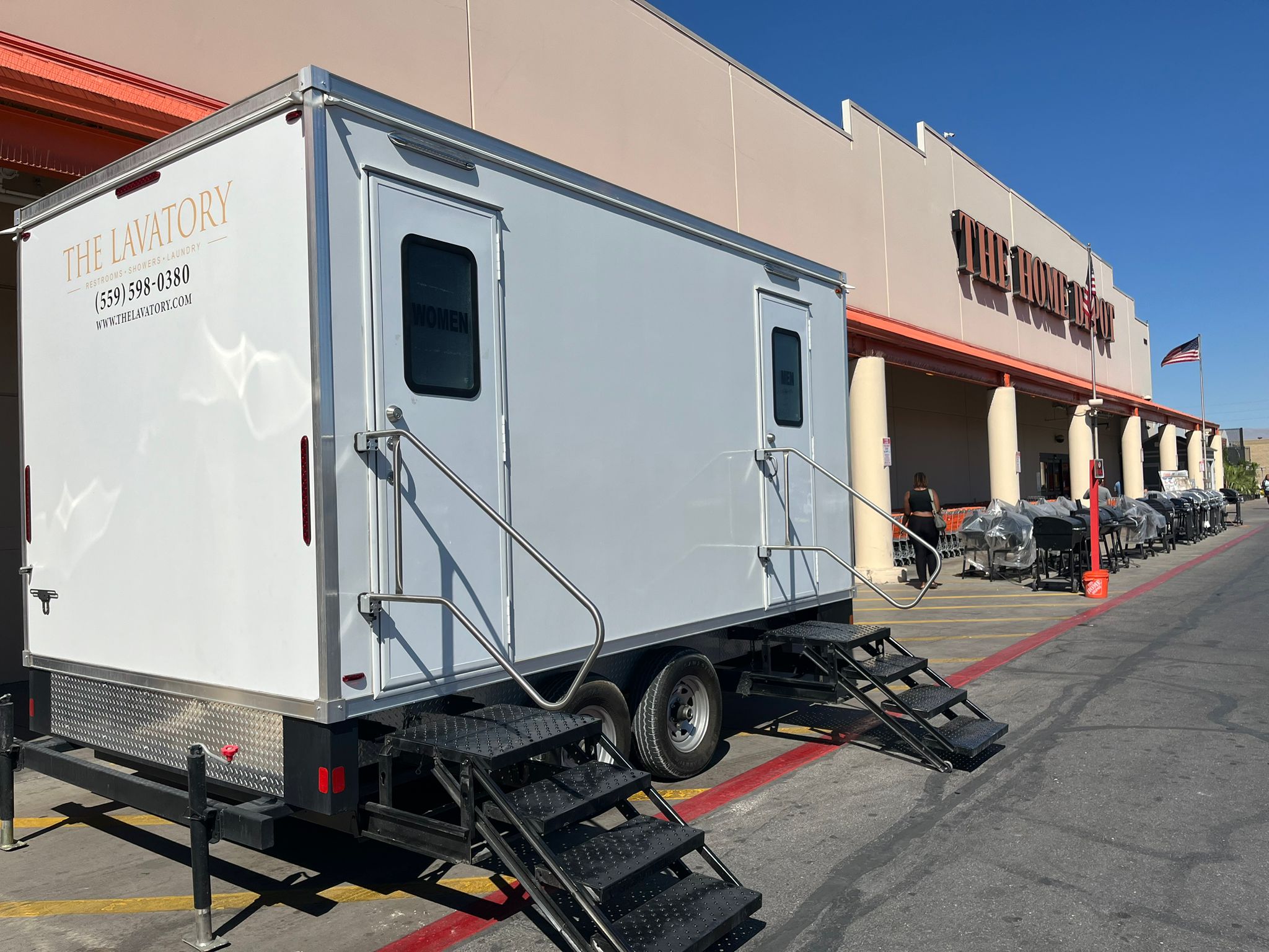 Denver corporate event restroom trailer rental. Luxury bathroom trailer at downtown business activation