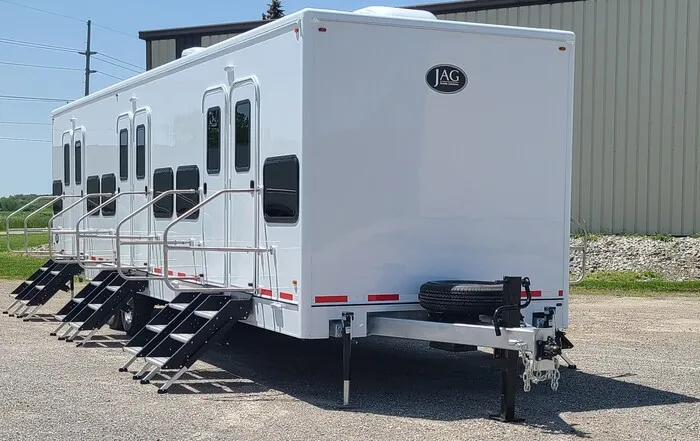 The Lavatory Denver bunkhouse sleeper trailer rentals luxury fleet