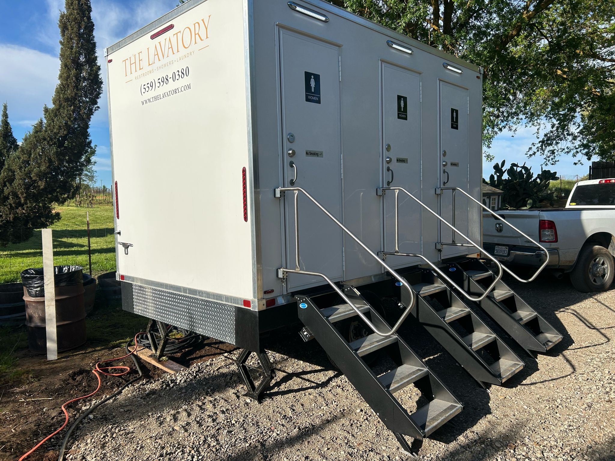 3 station luxury restroom trailer rental Denver. Mid-size event bathroom trailer for weddings and corporate functions