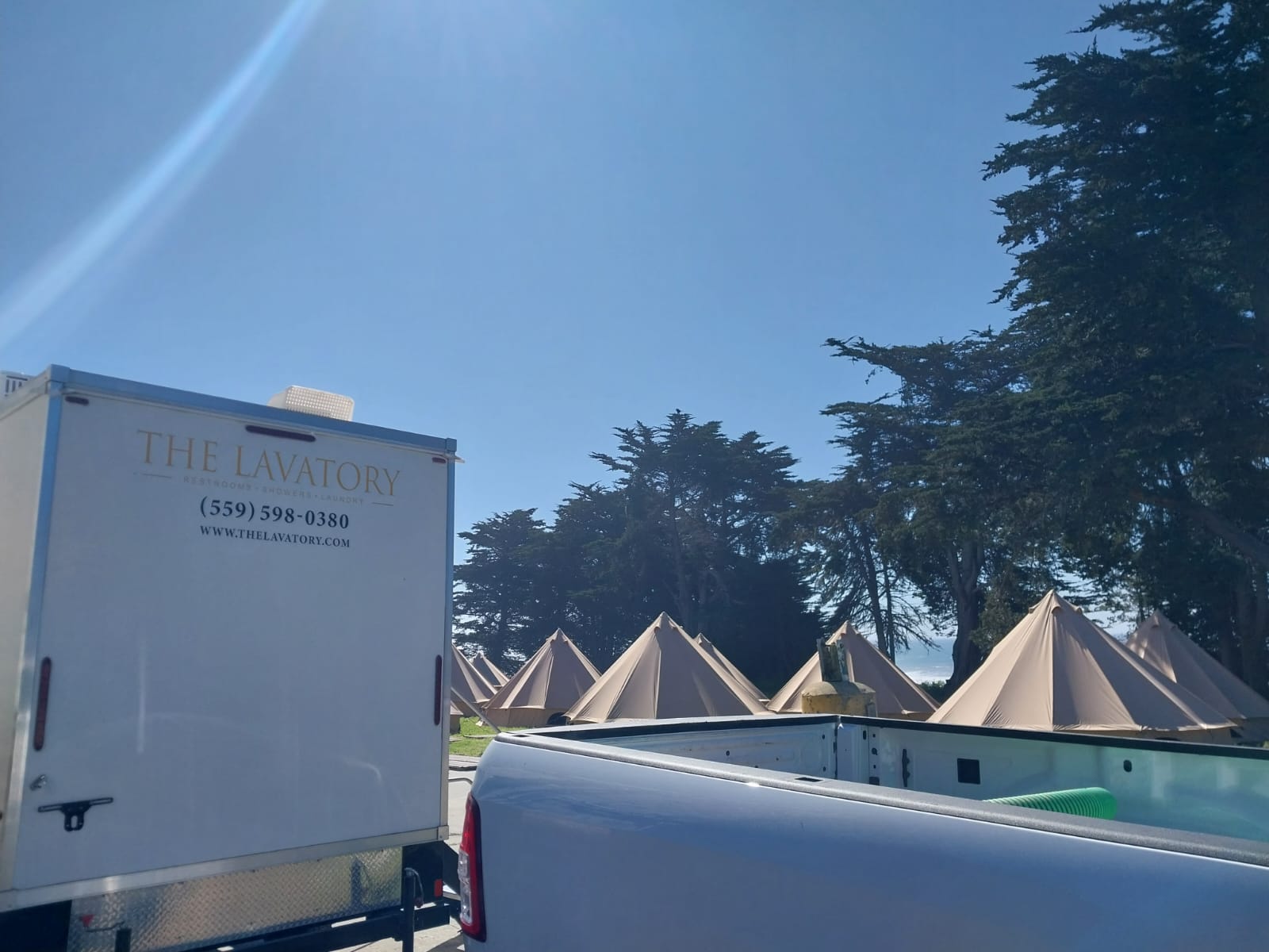 Denver glamping luxury restroom and shower trailer rental. Multi-day camping bathroom trailer with hot water