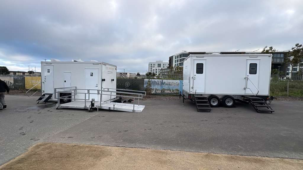 Denver construction site portable restroom trailer rental. Luxury jobsite bathroom trailer for crew use