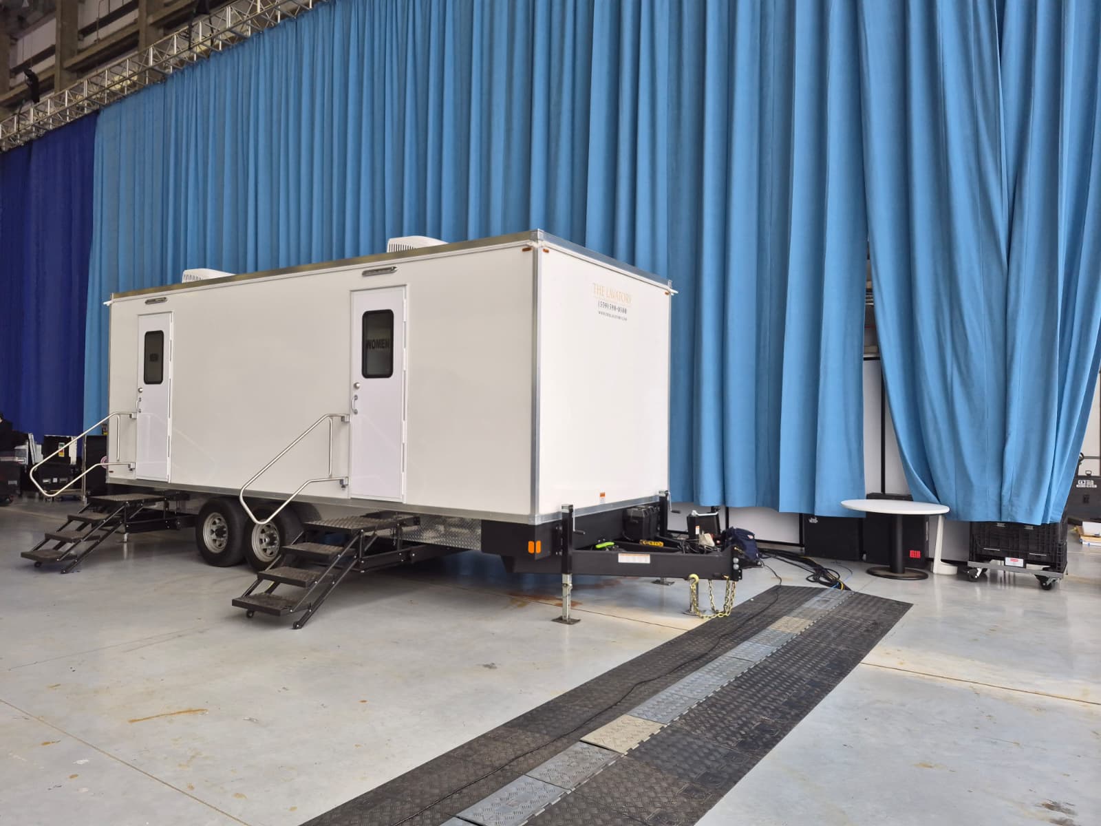 Denver indoor restroom trailer rental. Luxury bathroom trailer for warehouse renovations and indoor arena events